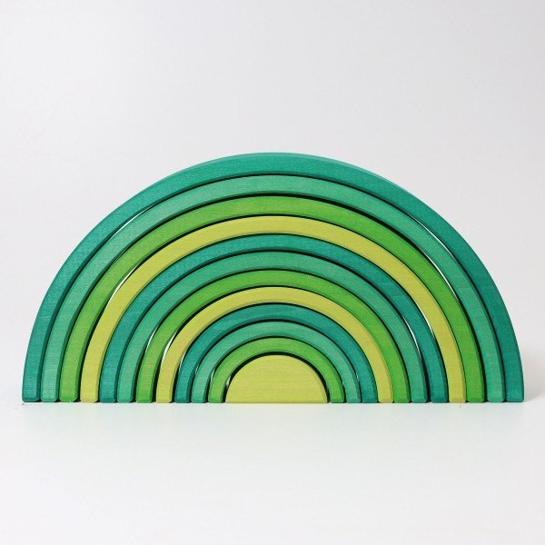 Grand arc-en-ciel vert forêt